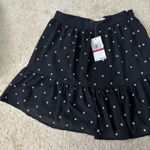 Michael Kors black white metal grommets zipper ruffle